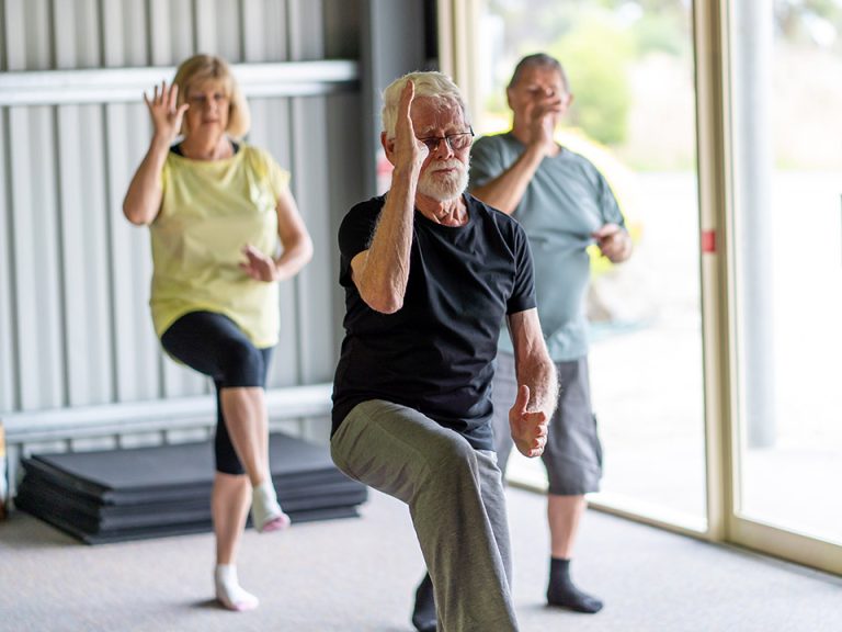 Group people doing Tai Chi