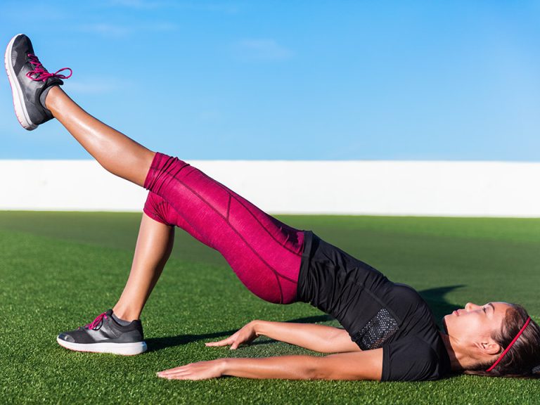 woman doing Glute Bridges