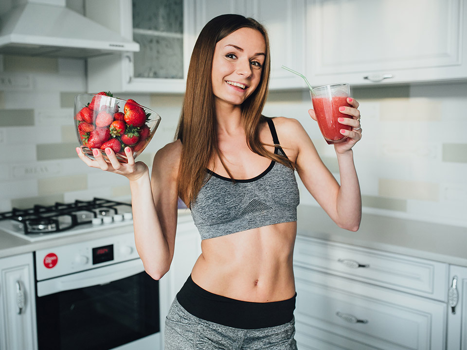 fitness woman drinking smoothie