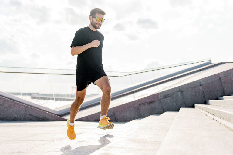 Man running on the street and stairs Train Daily